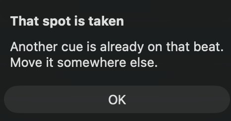 A cue being dragged with an overlap warning showing